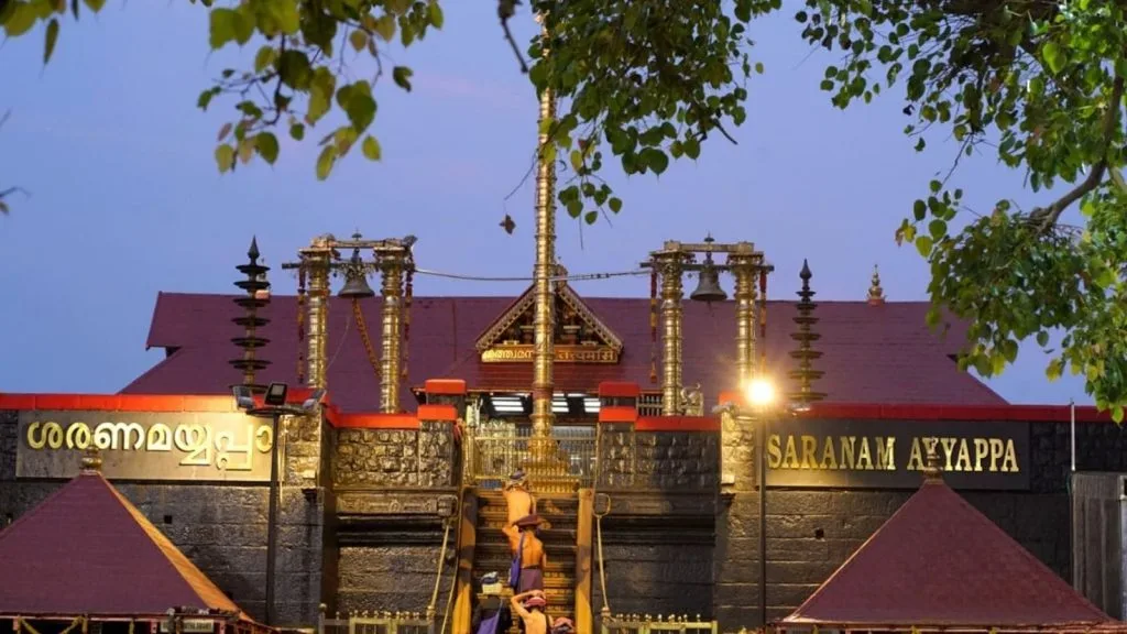 Devotees traveling from Chennai to Sabarimala on a guided pilgrimage tour